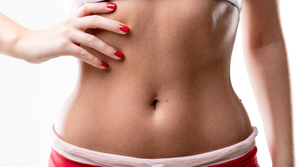 closeup of a good shaped woman's flat belly