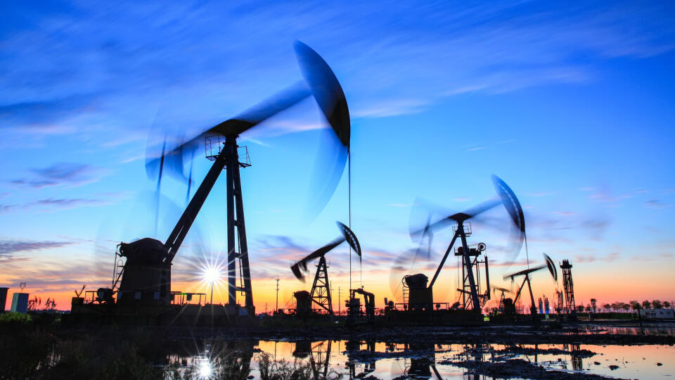 Oil,Field,Site,,In,The,Evening,,Oil,Pumps,Are,Running,