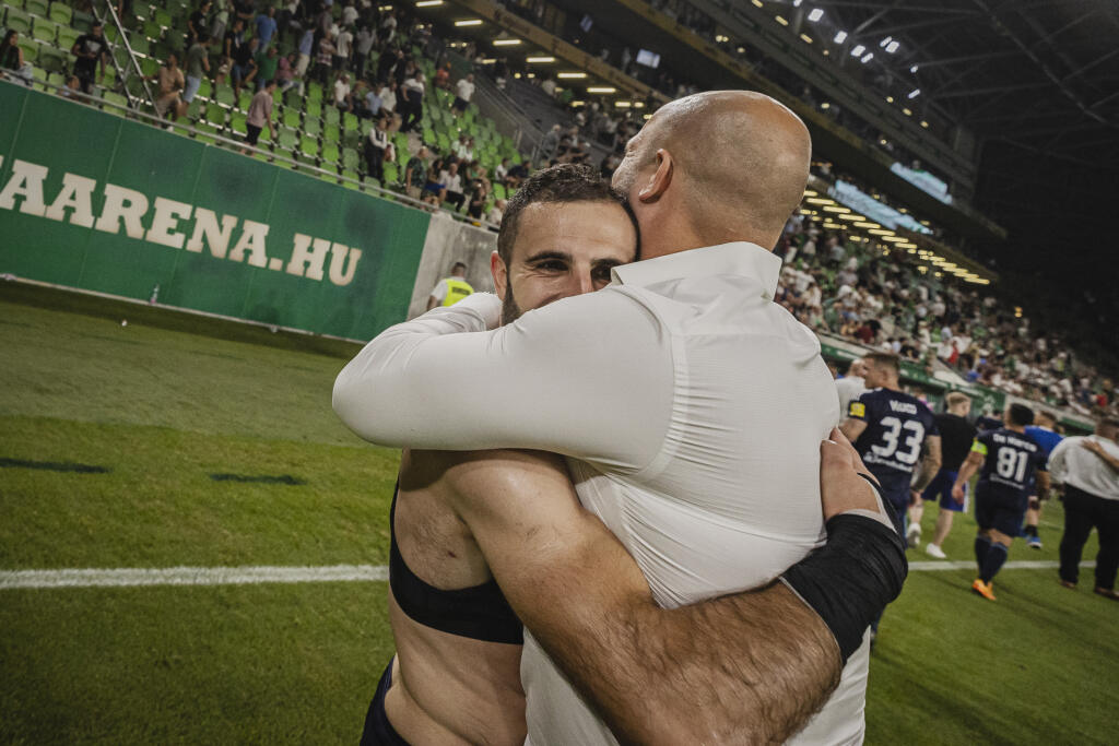 Na snímke Giorgi Čakvetadze a Ivan Kmotrík počas prvého zápasi 2. predkola Ligy majstrov UEFA medzi Ferencvárosi Torna Club a ŠK Slovan Bratislava.