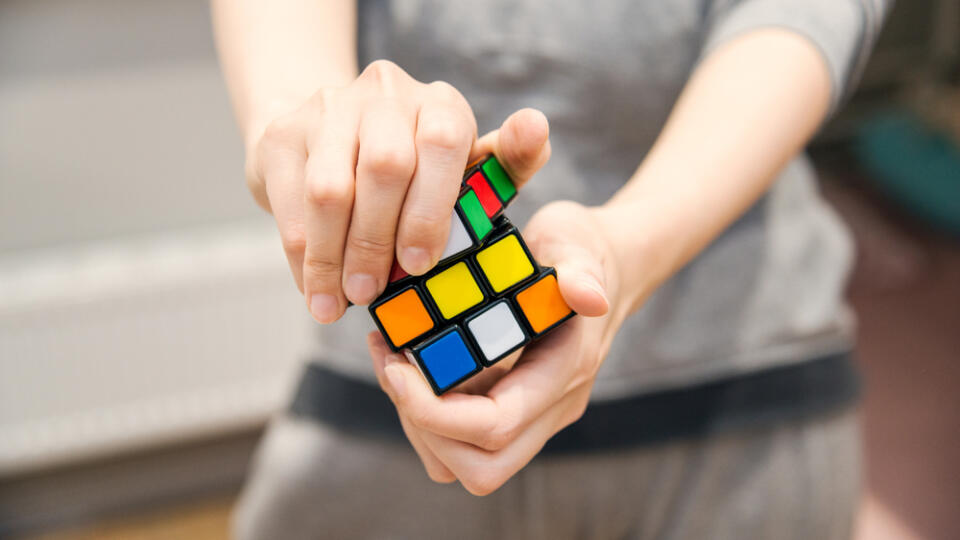 Female,Hands,Holding,A,Rubik's,Cube