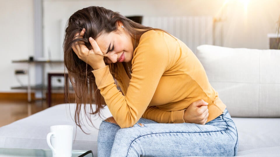 Young,Sick,Woman,With,Hands,Holding,Pressing,Her,Crotch,Lower