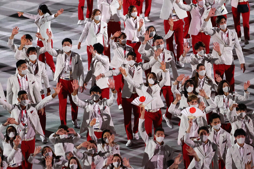 Usporiadateľská krajina vsadila na klasiku a vytiahla outfit vo farbách japonskej vlajky.