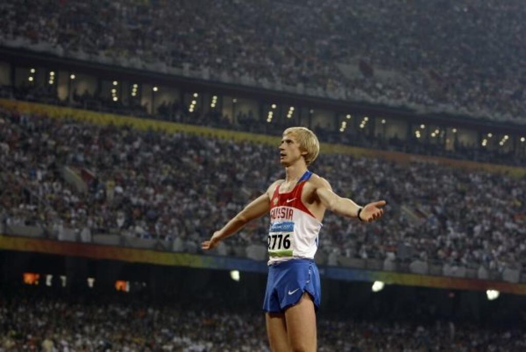 Russia's gold medal winner Andrey Silnov gestures in the men's high jump final during the athletics competitions in the National Stadium at the Beijing 2008 Olympics in Beijing, Tuesday, Aug. 19, 2008. (AP Photo/David Guttenfelder)