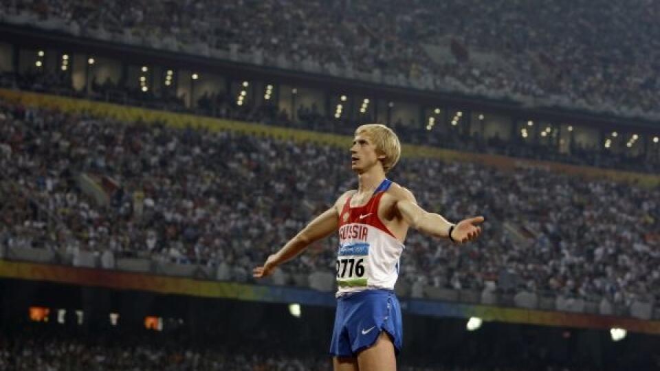 Russia's gold medal winner Andrey Silnov gestures in the men's high jump final during the athletics competitions in the National Stadium at the Beijing 2008 Olympics in Beijing, Tuesday, Aug. 19, 2008. (AP Photo/David Guttenfelder)