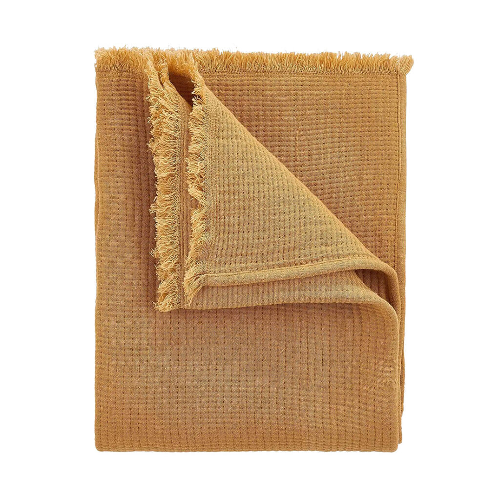Žltá deka Cocoon, www.butlers.sk, 44,99 €