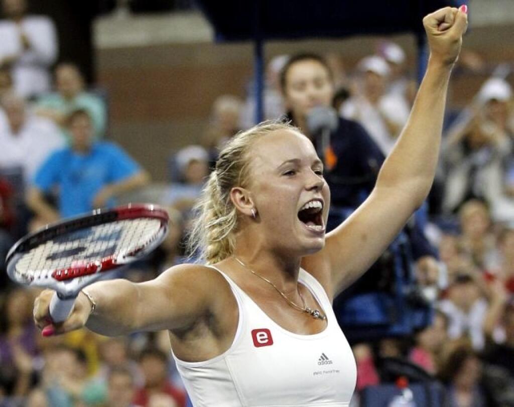 Caroline Wozniacki, of Denmark, reacts after defeating Svetlana Kuznetsova, of Russia, in the fourth round of the U.S. Open tennis tournament, Monday, Sept. 5, 2011, in New York. (AP Photo/Elise Amendola)