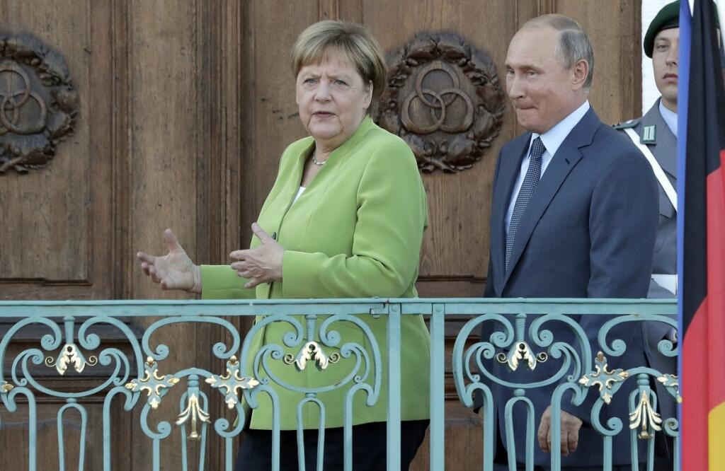 Putin a Merkelová spolu rokujú