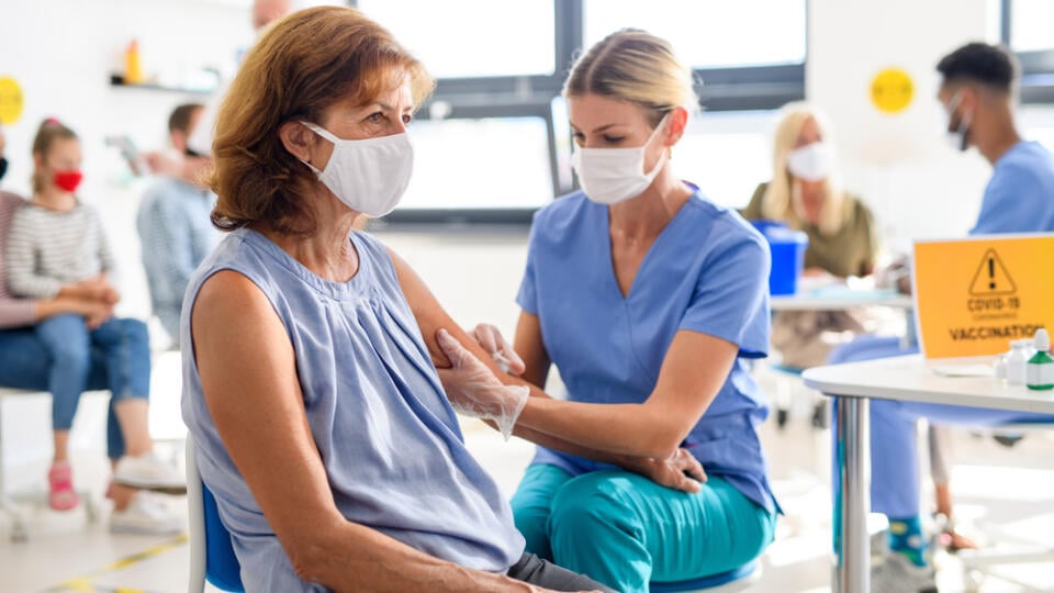 Woman,With,Face,Mask,Getting,Vaccinated,,Coronavirus,,Covid-19,And,Vaccination