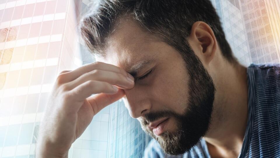 Sick disappointed man feeling bad himself and closing eyes.