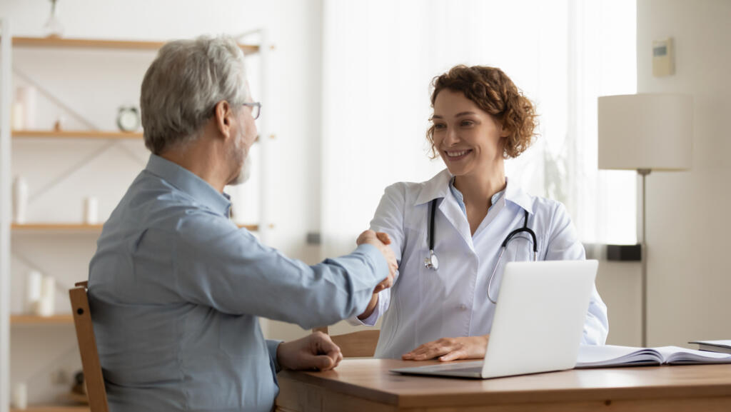 Smiling,Young,Female,Doctor,Shake,Hand,Close,Health,Insurance,Deal