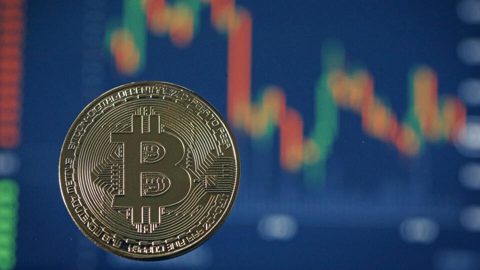 LONDON, ENGLAND - OCTOBER 24: A visual representation of the digital Cryptocurrency, Bitcoin on October 24, 2017 in London, England. Cryptocurrencies including Bitcoin, Ethereum, and Lightcoin have seen unprecedented growth in 2017, despite remaining extremely volatile. While digital currencies across the board have divided opinion between financial institutions, and now have a market cap of around 175 Billion USD, the crypto sector coninues to grow, as it sees wider mainstreem adoption. (Phot
