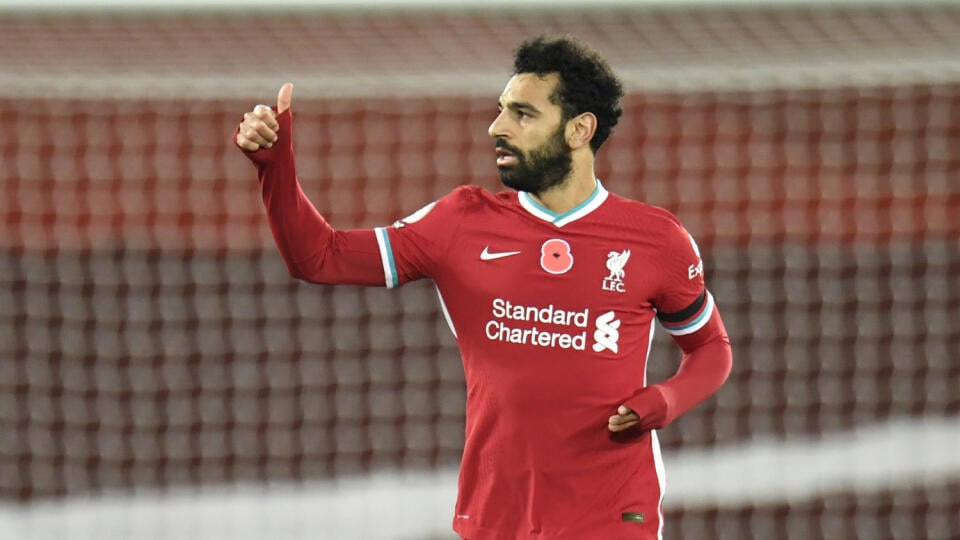 KK35 Liverpool - Futbalista Liverpoolu Mohamed Salah sa teší po góle v zápase 7. kola anglickej Premier League FC Liverpool - West Ham 31. októbra 2020 v Liverpoole. FOTO TASR/AP
Liverpool's Mohamed Salah celebrates after he scores his sides first goal during the English Premier League soccer match between Liverpool and West Ham United at Anfield stadium in Liverpool, England, Saturday, Oct. 31, 2020. (Peter Powell/Pool via AP)