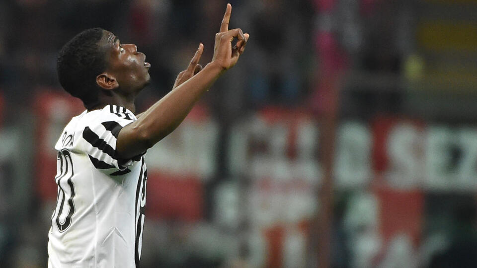 Juventus' Paul Pogba celebrates after scoring during a Serie A soccer match between AC Milan and Juventus, at the San Siro stadium in Milan, Italy, Saturday, April 9, 2016. (Daniel Dal Zennaro/ANSA via AP Photo) ITALY OUT