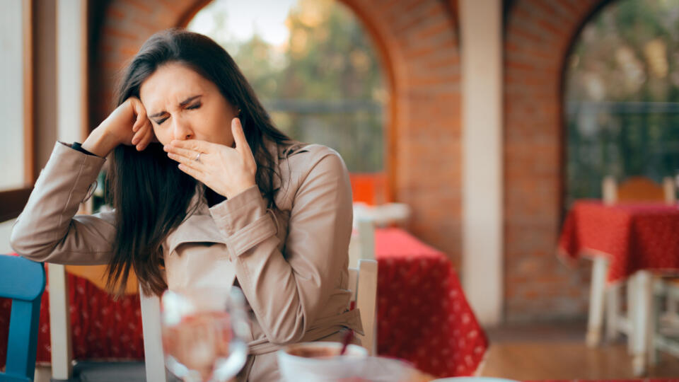 Sleepy,Woman,Yawning,While,Waiting,In,A,Restaurant.,Tired,Girl