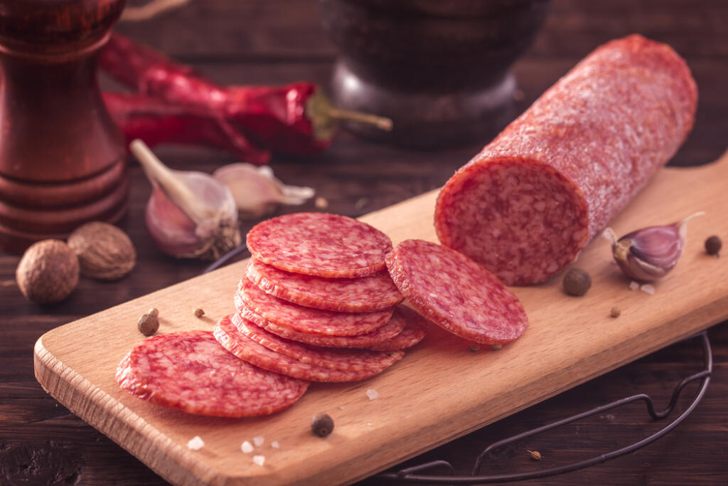 Sliced,Salami,On,Cutting,Board.toned