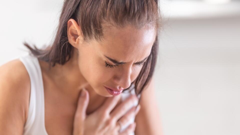 Woman,Heeling,Big,Pain,On,Her,Chest,,Holding,Hand,Over