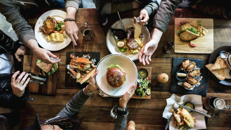 Friends,All,Together,At,Restaurant,Having,Meal
