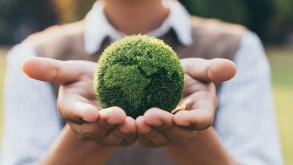 Asian,Teenager,Showing,Earth,On,Hand,,Ecology,And,Environment,Sustainable