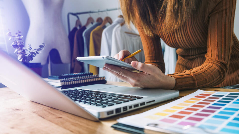 Fashion,Designer,L,Young,Asian,Woman,Working,Using,Laptop,,Tablet