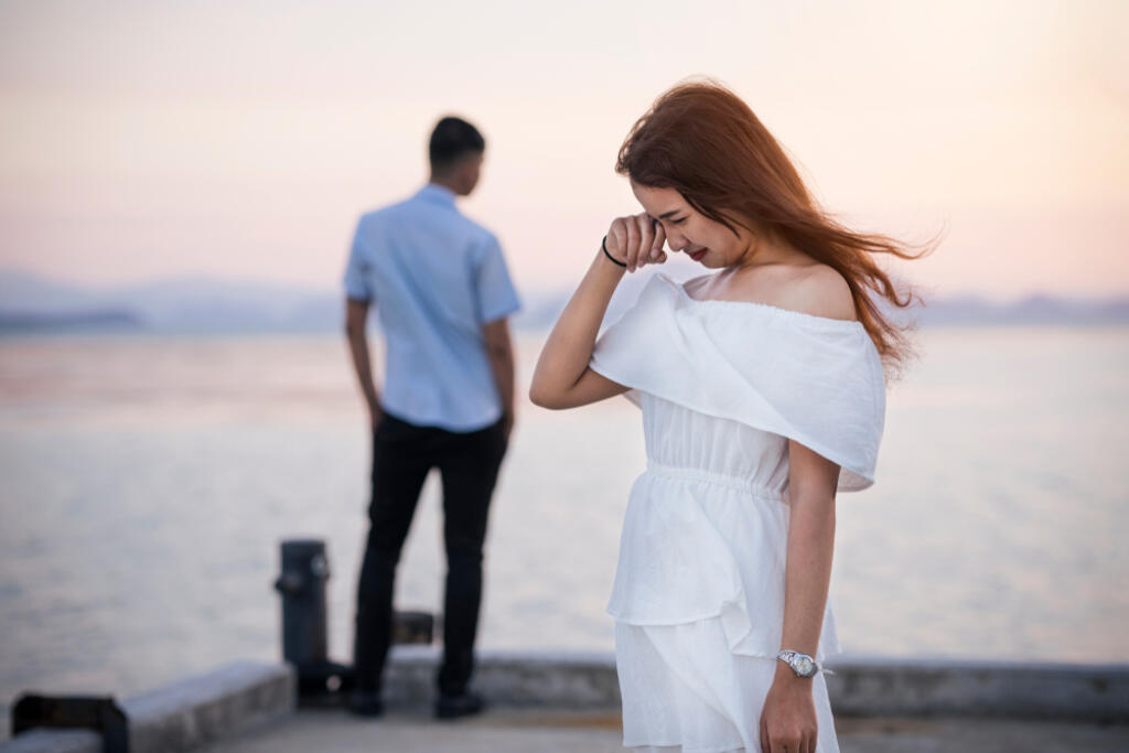 Young,Couple,Break,Up,At,The,Sea,Deck.,Girl,Crying