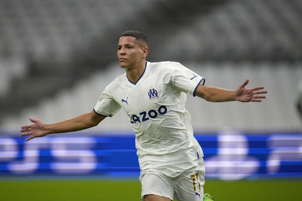 EBE 36 Marseille - Na snímke marocký stredopoliar Marseille Amine Harit osavuje svoj gól a druhý mužstva v zápase D-skupiny 3. kola skupinovej fázy Ligy majstrov vo futbale Olympique Marseille - Sporting Lisabon v Marseille 4. októbra 2022. FOTO TASR/AP
Marseille's Amine Harit celebrates after scoring his side's second goal during the Champions League group D soccer match between Marseille and Sporting at the Velodrome stadium in Marseille, southern France, Tuesday, Oct. 4, 2022. (AP Photo/Dan