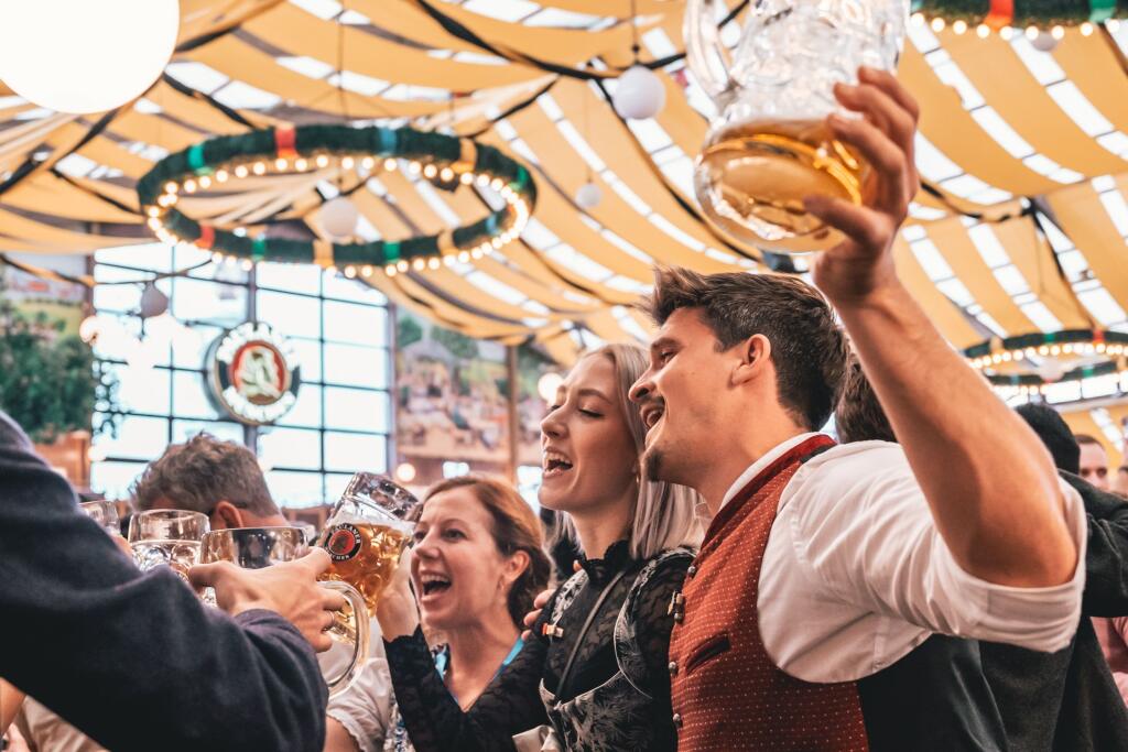 Munich,,Germany,-,Sep,18,,2022:,People,Enjoying,Oktoberfest,In