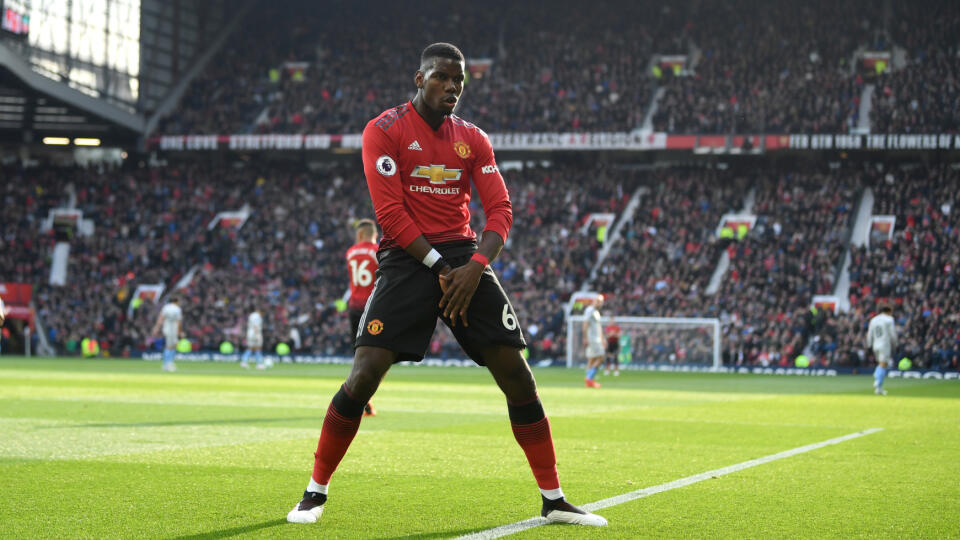 MANCHESTER, ENGLAND - APRIL 13: Paul Pogba of Manchester United celebrates as he scores his team's first goal from the penalty spot during the Premier League match between Manchester United and West Ham United at Old Trafford on April 13, 2019 in Manchester, United Kingdom. (Photo by Gareth Copley/Getty Images)