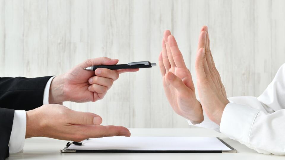Business,Man's,Hand,Recommending,Contract,And,Customer's,Hand,Refusing,It