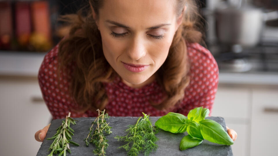 Portrait,Of,Young,Housewife,Enjoying,Fresh,Spices,Herbs