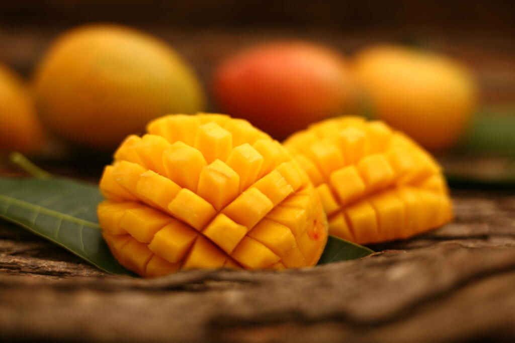 Famous,Alphonso,Mango,Slices,Over,Wood,Background,selective,Focus,Image.