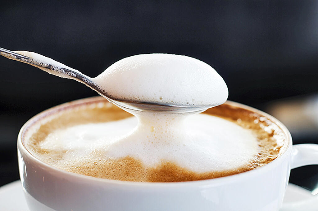Top,Of,View,Cappuccino,Coffee,On,Wood,Table,Focus,At