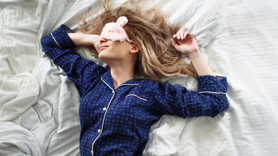 Cute,Blonde,In,Her,Bed,In,Blue,Pajamas,And,Sleep