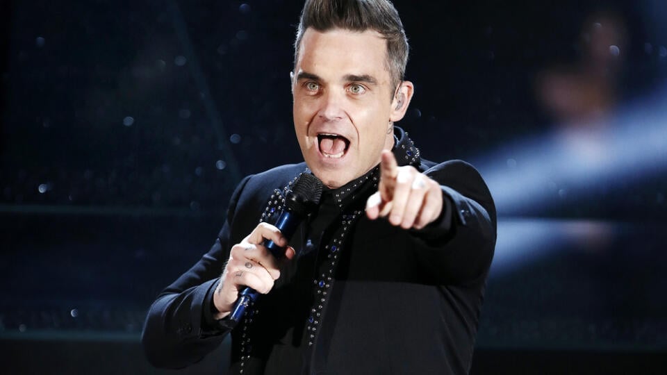 S kým randil potetovaný Robbie Williams?