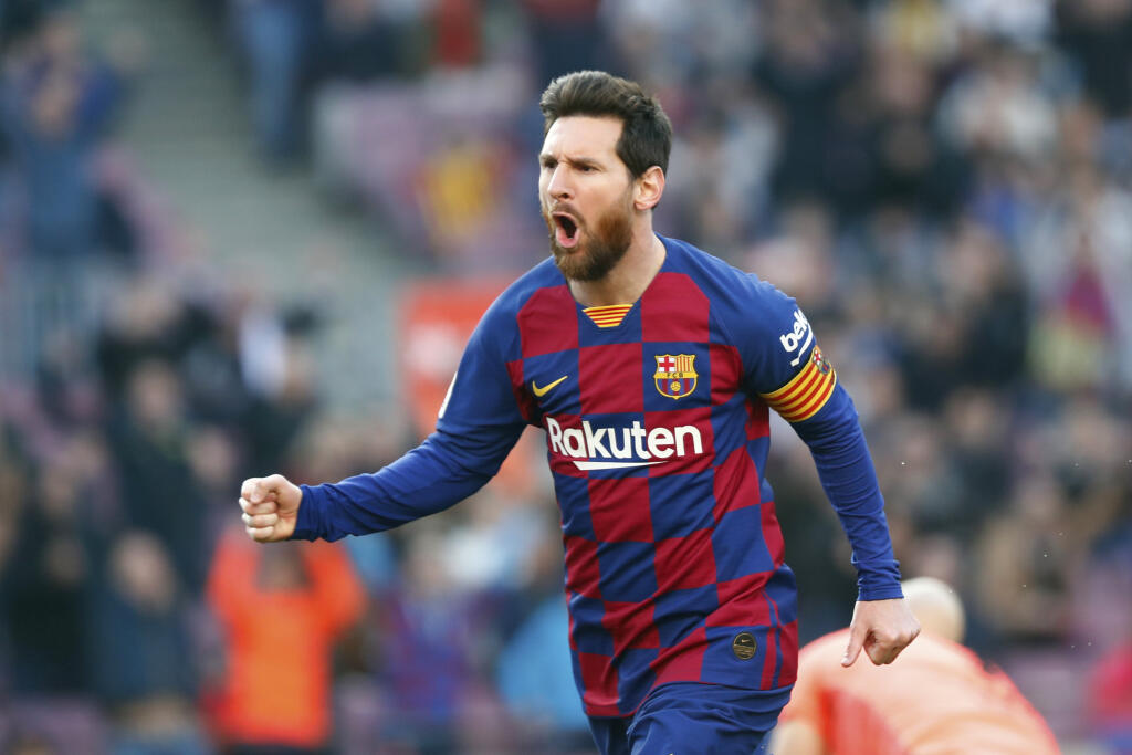 KK59 Barcelona - Futbalista FC Barcelony Lionel Messi sa teší zo svojho gólu v zápase 25. kola španielskej La Ligy FC Barcelona - SD Eibar 22. februára 2020 v Barcelone. FOTO TASR/AP
Barcelona's Lionel Messi celebrates after scoring his side's opening goal during a Spanish La Liga soccer match between Barcelona and Eibar at the Camp Nou stadium in Barcelona, Spain, Saturday Feb. 22, 2020. (AP Photo/Joan Monfort)