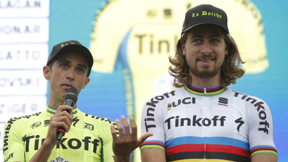 Spain's Alberto Contador, left, and Slovakia's Peter Sagan are presented on stage during the official team presentation two days before the start of the Tour de France cycling race in Sainte-Mere-Eglise, France, Thursday, June 30, 2016. (AP Photo/Christophe Ena)