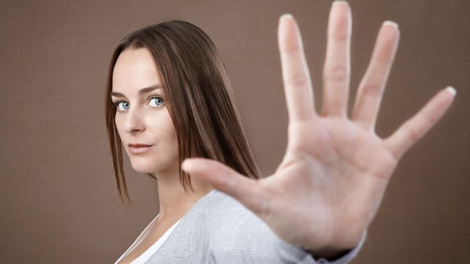 Woman giving hand stop sign