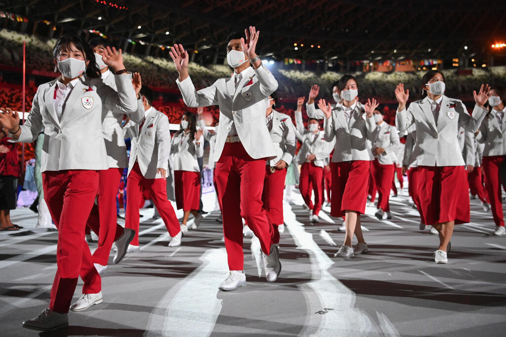 Usporiadateľská krajina vsadila na klasiku a vytiahla outfit vo farbách japonskej vlajky.
