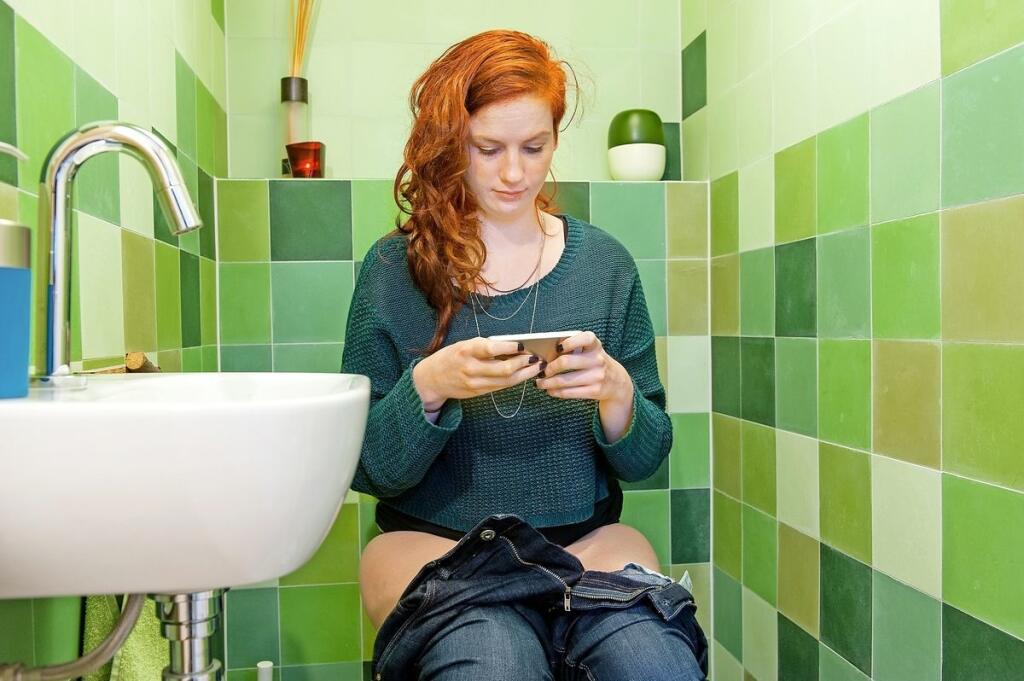 Bathroom redhead woman POV