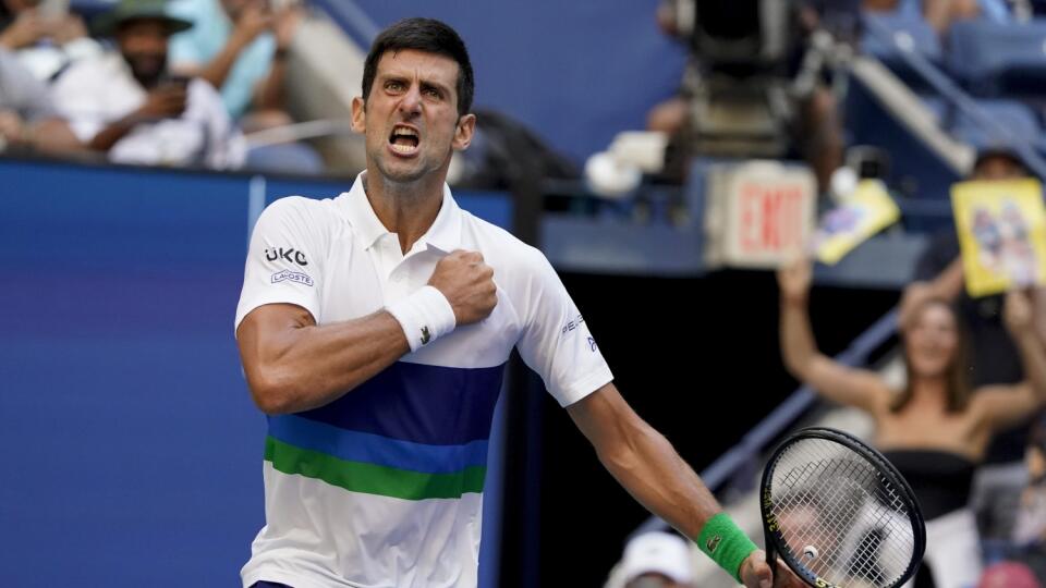 JB 7 New York - Srbský tenista Novak Djokovič reaguje po bodovom zisku v zápase proti Japoncovi Kei Nišikorimu v 3.kole dvojhry na grandslamovom tenisovom turnaji US Open v New Yorku 4. septembra 2021. FOTO TASR/AP
Novak Djokovic, of Serbia, reacts after scoring a point against Kei Nishikori, of Japan, during the third round of the US Open tennis championships, Saturday, Sept. 4, 2021, in New York. (AP Photo/John Minchillo)