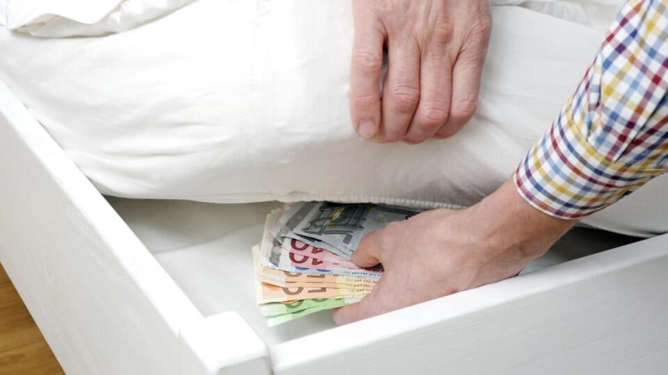 Caucasian,Man,Is,Hiding,Stash,Of,Euro,Bills,Under,The