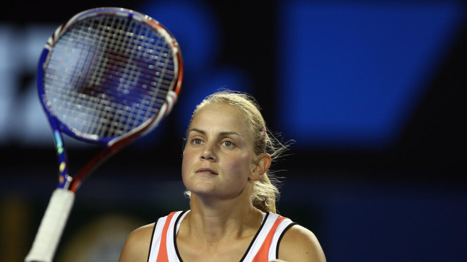 MELBOURNE, AUSTRALIA - JANUARY 18:  Jelena Dokic of Australia throws her racquet in the air after a point in her first round match against Alisa Kleybanova of Russia during day one of the 2010 Australian Open at Melbourne Park on January 18, 2010 in Melbourne, Australia.  (Photo by Quinn Rooney/Getty Images)