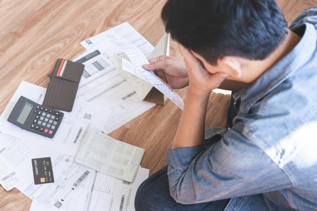 Financial,Concept,,Owe,Asian,Young,Man,Sitting,Suffer,,Stressed,And