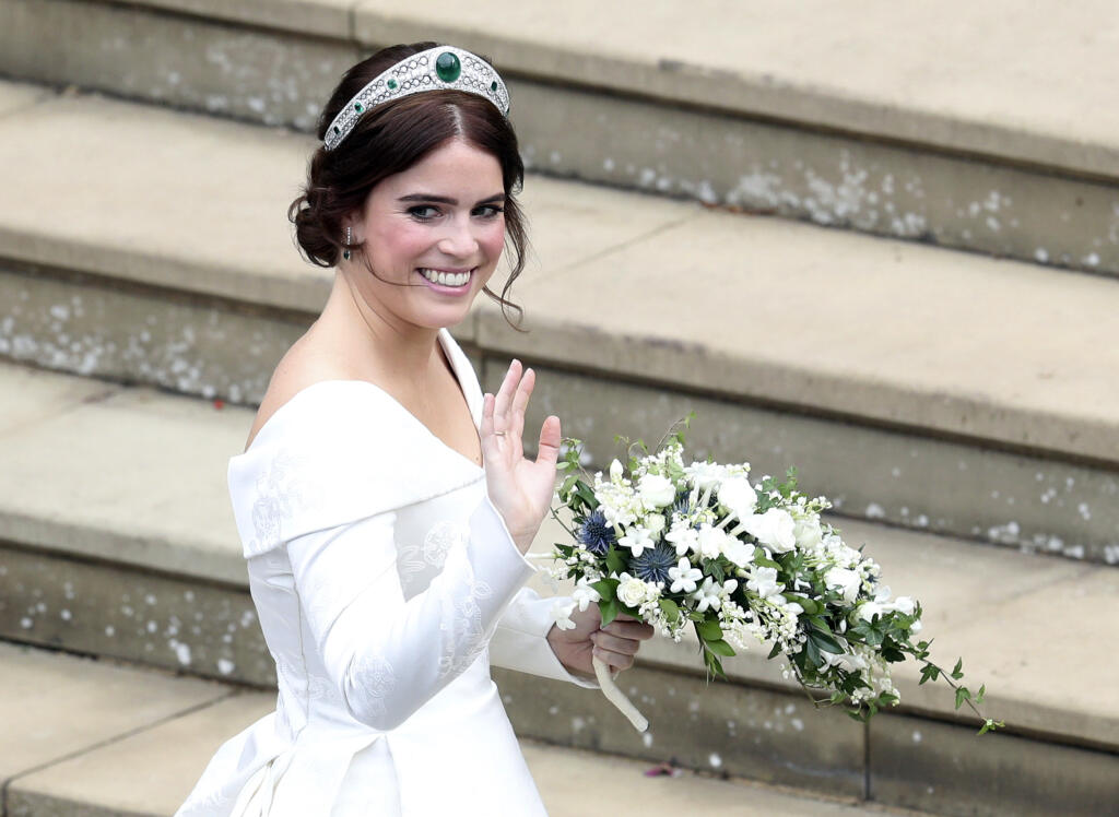 Princess Eugenie arrives for her wedding to Jack Brooksbank at St George’s Chapel, Windsor Castle, near London, England, Friday Oct. 12, 2018. (Andrew Matthews, Pool via AP)