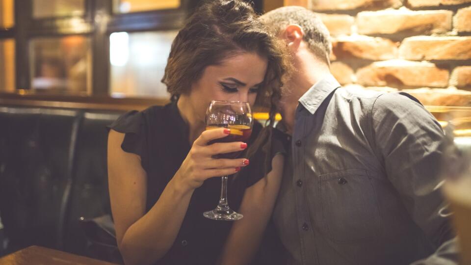 Couple Enjoying Night Out At Cocktail Bar