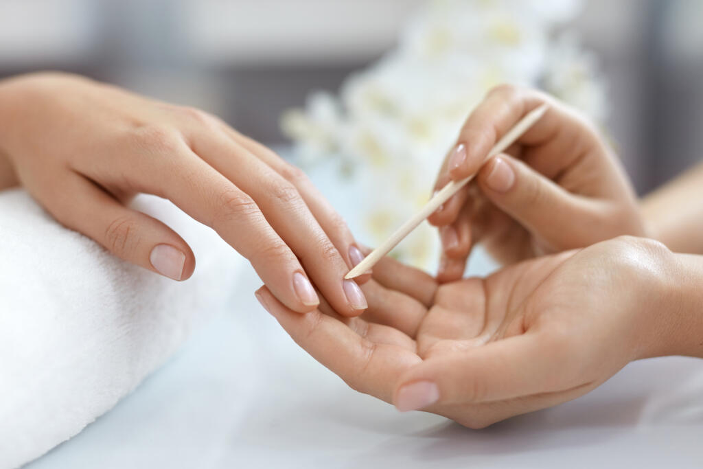 Nail,Salon.,Closeup,Of,Beautician,Hands,Cleaning,Female,Client's,Nails