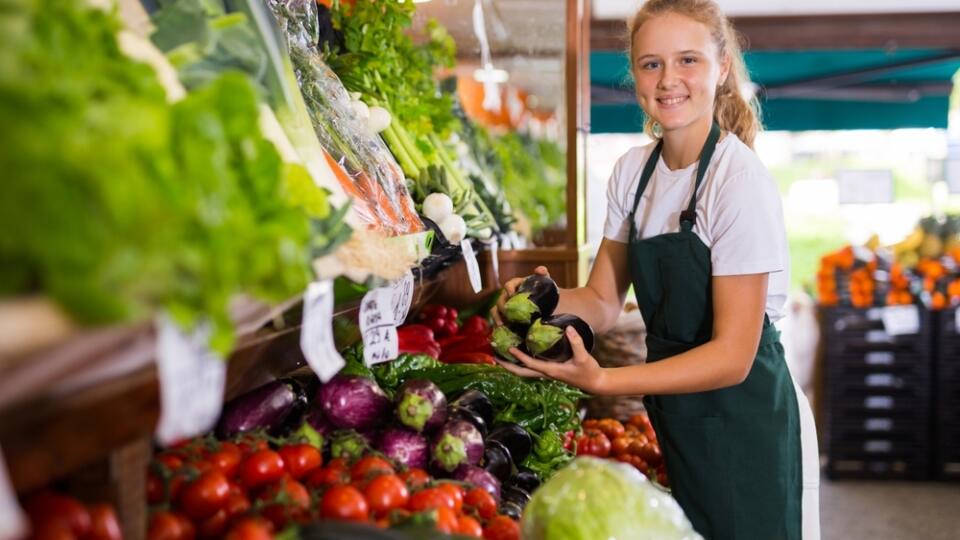 Young,Girl,Seller,In,Uniform,Working,In,Supermarket,At,Her