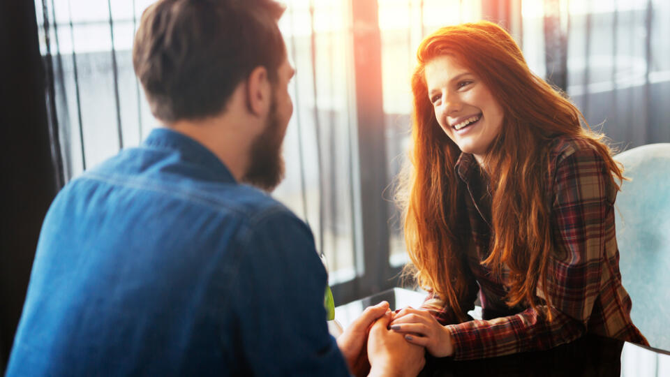 Happy,Woman,On,A,First,Date,With,Handsome,Man,Showing