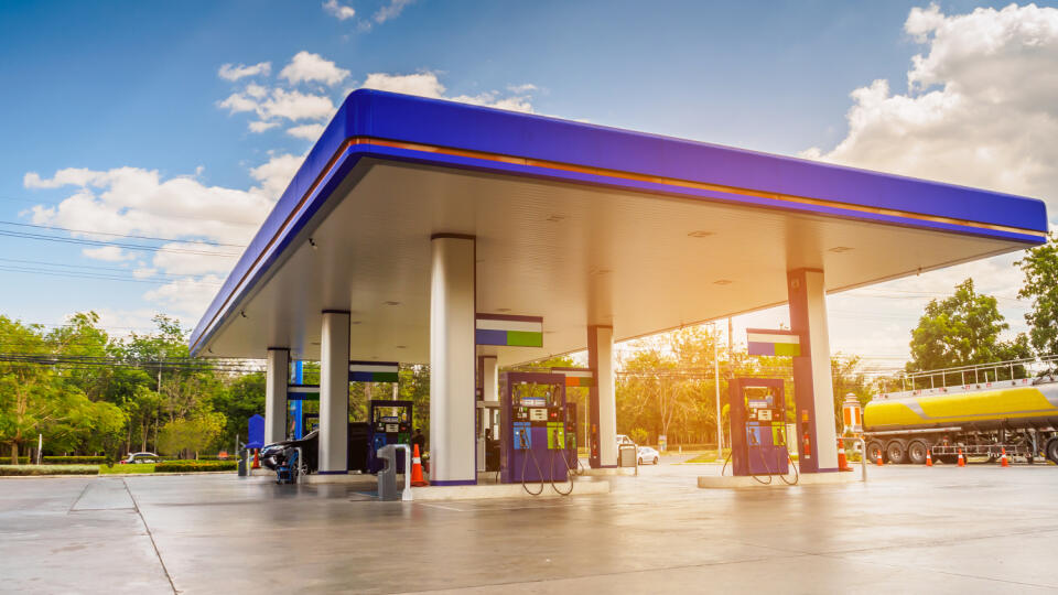 Gas,Station,With,Clouds,Sky,And,Sun,Light