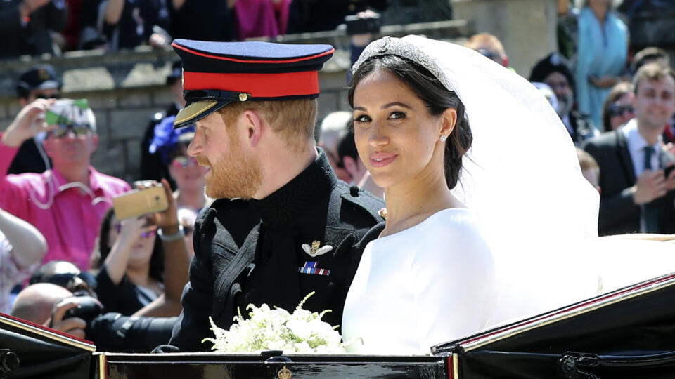 Britain's Prince Harry and his wife Meghan Markle leave after their wedding ceremony, at St. George's Chapel in Windsor Castle in Windsor, near London, England, Saturday, May 19, 2018. (Gareth Fuller/pool photo via AP) 