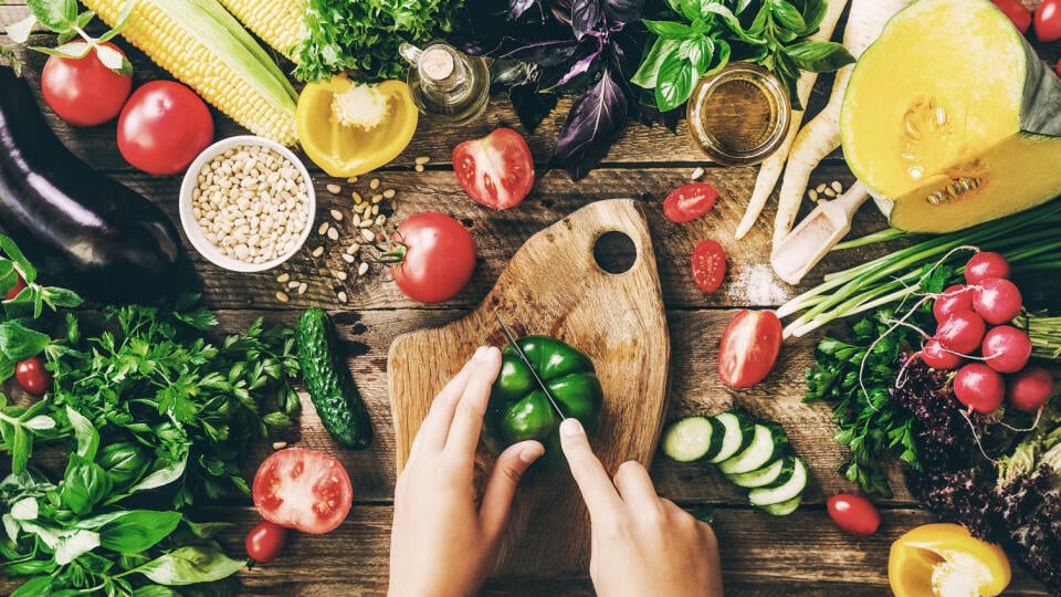 Woman,Hands,Cutting,Vegetables,On,Wooden,Background.,Vegetables,Cooking,Ingredients,